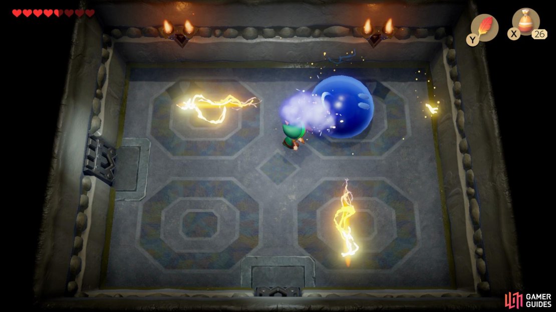 In order to take out the Giant Buzz Blob you’ll need to sprinkle it with Magic Powder to turn it blue allowing you to deal damage,