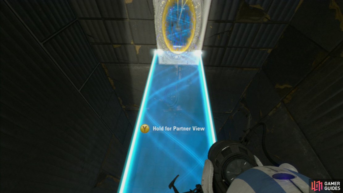 Player 2: Swap out player 1’s portal with your own at the top and then ask player 1 to stand on the Faith Plate. Just like they did with you, you need to fire an exit portal on the lower portion of the wall, so the light bridge extends underneath them. Once player one has joined you at the top, look behind you for the slanted wall panel up in the distance and fire a portal up here. Now have your second portal positioned at the end of the light bridge you’re both currently on and this’ll create a walkway.