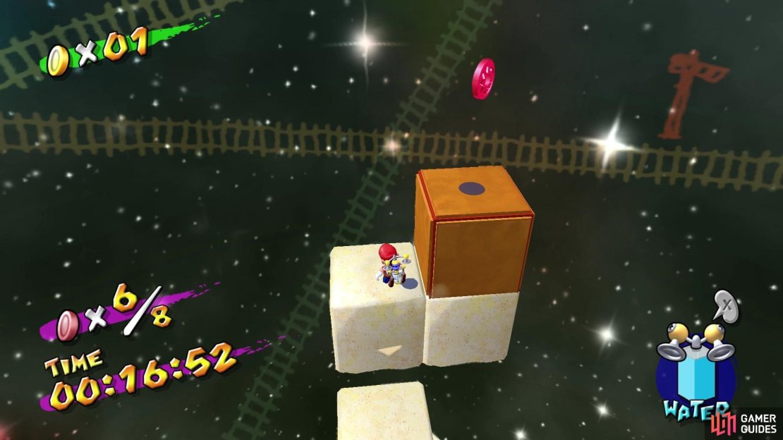 The last two red coins are at the top of some sandy steps.
