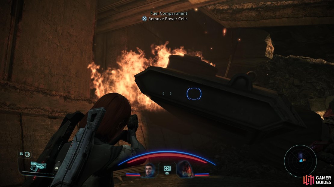 After the Varren are defeated, search the front of the vehicle to find the Power Cells.