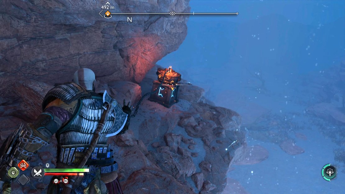 To the left of the chest. You can use your axe to break the rubble covering the brazier.