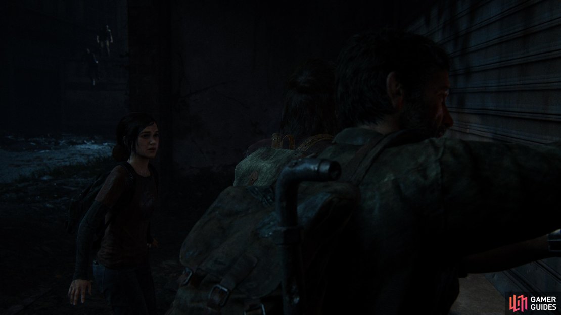 Joel, Ellie and Tess make their way into the Museum.