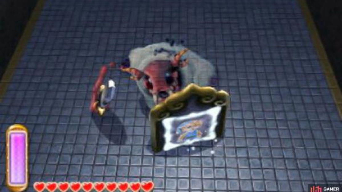 When the battle begins, run up to the boss’s shield and merge into it. This will confuse the boss and it will look around for Link, moving its shield behind itself. At this point, emerge and attack the boss from the back. You can use Link’s good ol’ sword or other offensive items, such as the bow.