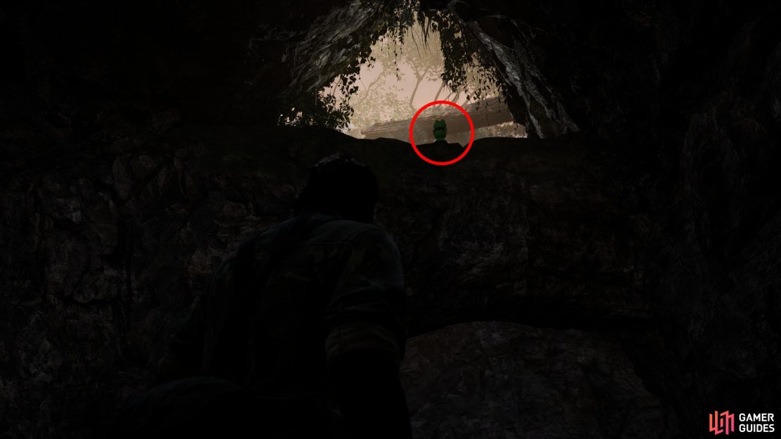 Head north to reach a chamber with a side chamber off to the northwest, under a fallen bolder. Crawl into this chamber to disarm some Claymores, then turn around to find this Kerotan atop the boulder you just crawled under.