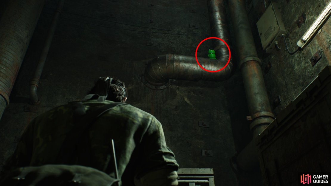 After the scene in Tikhogornyj: Behind Waterfall, head up a passage to the north until you find a red door to the left. Go inside, find a ladder, stand in front of it, and turn around and look up to spot this Kerotan on a pipe.