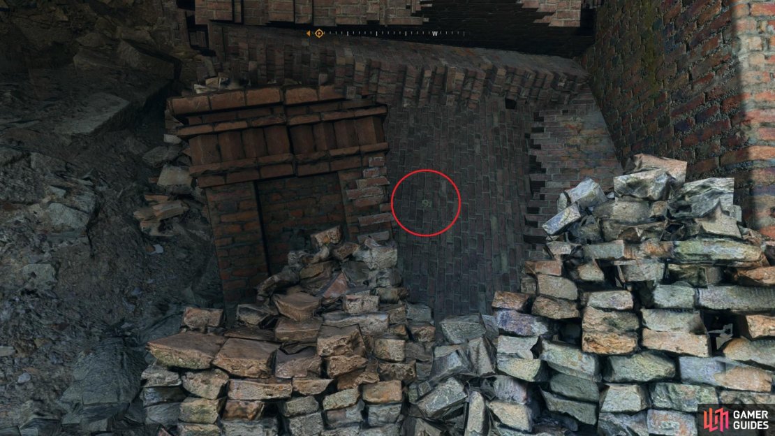 Walk across the train tracks near the Monastery and look for this Harry Potter Easter Egg. Walk through the easter egg to enter a secret area and then follow it along to reach the weapon. Image via Gamer Guides / Techland.