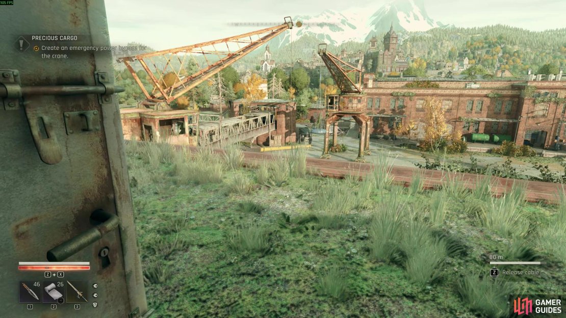 Enter the warehouse and solve the double power cable task to power the crane in the distance. Image via Gamer Guides / Techland.