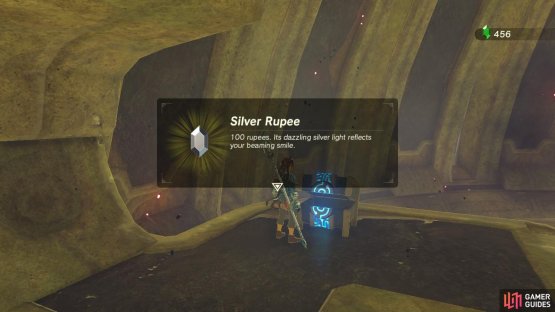 The treasure chest is on the left side of the top of the wall.
