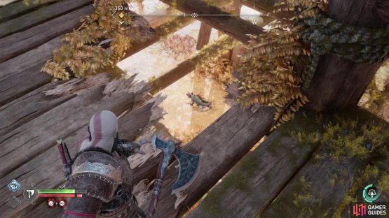 You can ambush it by climbing a nearby structure and tossing the Leviathan Axe through a hole in the floor.