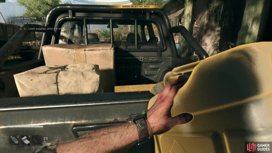Get the rations and fuel and place them in the truck in the cache. Image via Gamer Guides / Techland.