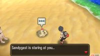 It might help to face away from Sandygast while trying to grab the sticker, in case you accidentally interact with Sandygast instead.