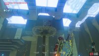 Use the metal crates to lift yourself up to the end of the shrine