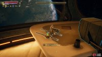 Pick up the Holographic Shroud from the captain&rsquo;s quarters.