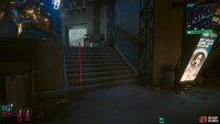 Then go up the stairs to your left and head through the door.