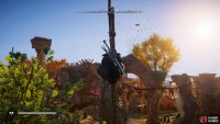 You&rsquo;ll find the flying paper atop a tall wooden pole, attached to the red canopies around the longhouse.
