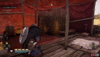 Loot the treasure chest at the back of the camp to find the Magister&rsquo;s Cloak.