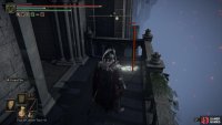 On the balcony, turn left, and jump over the balcony. Follow this around the building to a grassy area.
