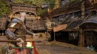 Throw the Draupnir Spear into this point in the wall to create a handhold for you to climb up.