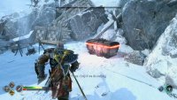 You’ll find the chest among the wreckage at the back of the camp.