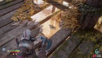 You can ambush it by climbing a nearby structure and tossing the Leviathan Axe through a hole in the floor.
