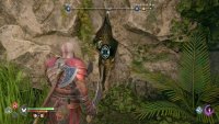 Toss your axe at the runic disc through the hole