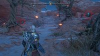 Head to the large gap near the end of the area, turn behind to find two runes next to each tree. This will require the spear to explode all three runes simultaneously.