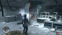 Press the red button in the center of the room.