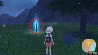 the blue stake sits next to a tree here.