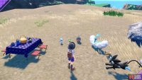 Setting up a picnic. (Credit: The Pokémon Company)