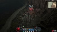 to find the the statue sitting near the rock face.