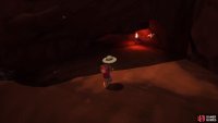 The entrance to the cave is on the ledge next to the truck