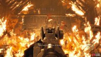You need to shoot the red barrels while they’re in his hands.