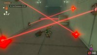 Crouch beneath the next set of lasers.