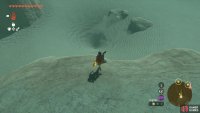 Jump into this sand pit to enter the ruins.