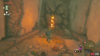 There will be a chest behind this rock wall you can break