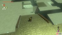 Glide down to the platform with the vehicles, near the broken stairs.