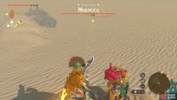 Toss any object onto the sand to lure the !Molduga out of the ground