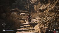 Simply go up the stairs to the right of the Rockrest Flat Shrine to reach the sand waterfall.