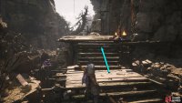 Defeat the spitting enemies along the way and head to the top of the scaffolding.
