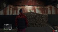 to find the action figure sitting on a wood chip pile. 