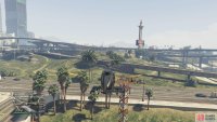 to find the signal jammer on the red and white tower.