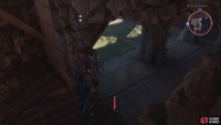 Climb the scaffolding on the other side to find a hole that drops behind the barrier.