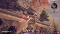 From the top platform, shoot the explosive barrels.