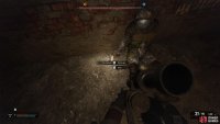 At the top of the stairs, a zombie will be to your left. Next to the enemy is a corpse with a Psi-Block.
