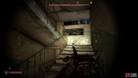 Follow the hallway to the end to find a stairwell.