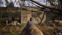 Go behind the house and shoot the padlock to enter the shed.