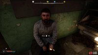 You’ll find him sitting down near the entrance to the shop.