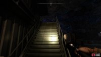 Take the stairs up on the left.