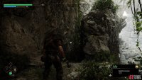 Climb up the rope in the cave.