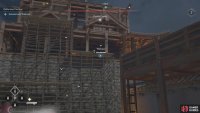 She’ll be near the top of the unfinished building.